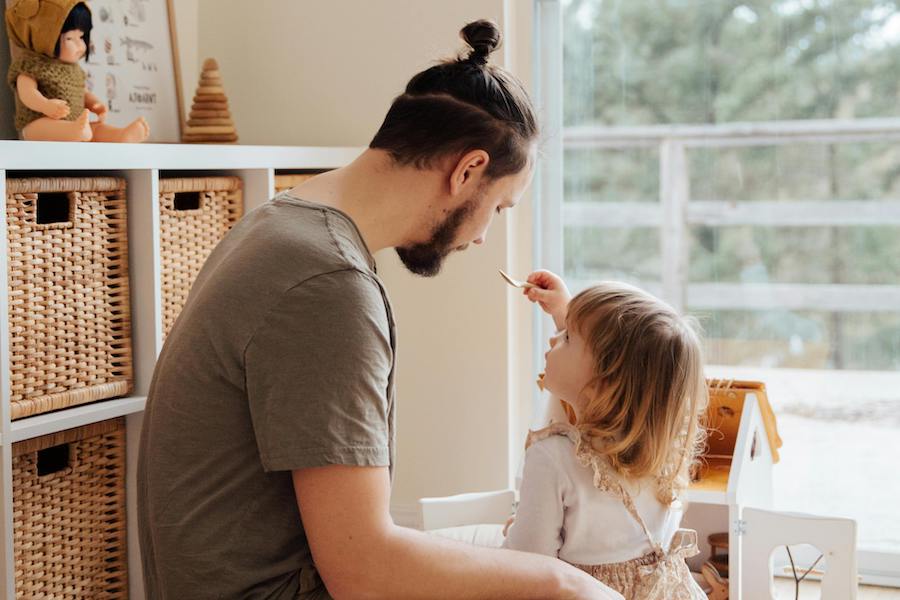 dad playing with daughter