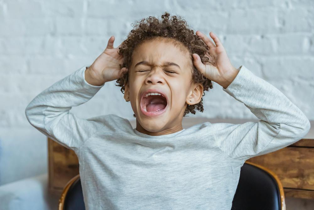 young child screaming
