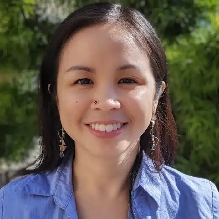 square image of gina li outdoors smiling